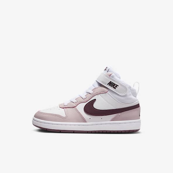 Girls high top nikes discount
